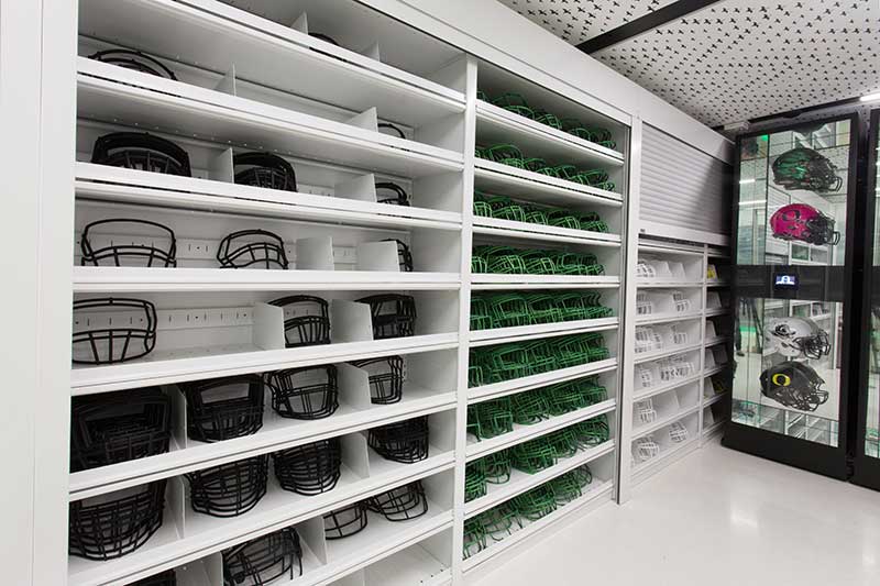 4-post shelving system holding football facemasks