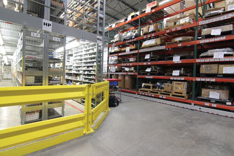 ActivRAC system holding auto parts, boxes, and pallets in a warehouse