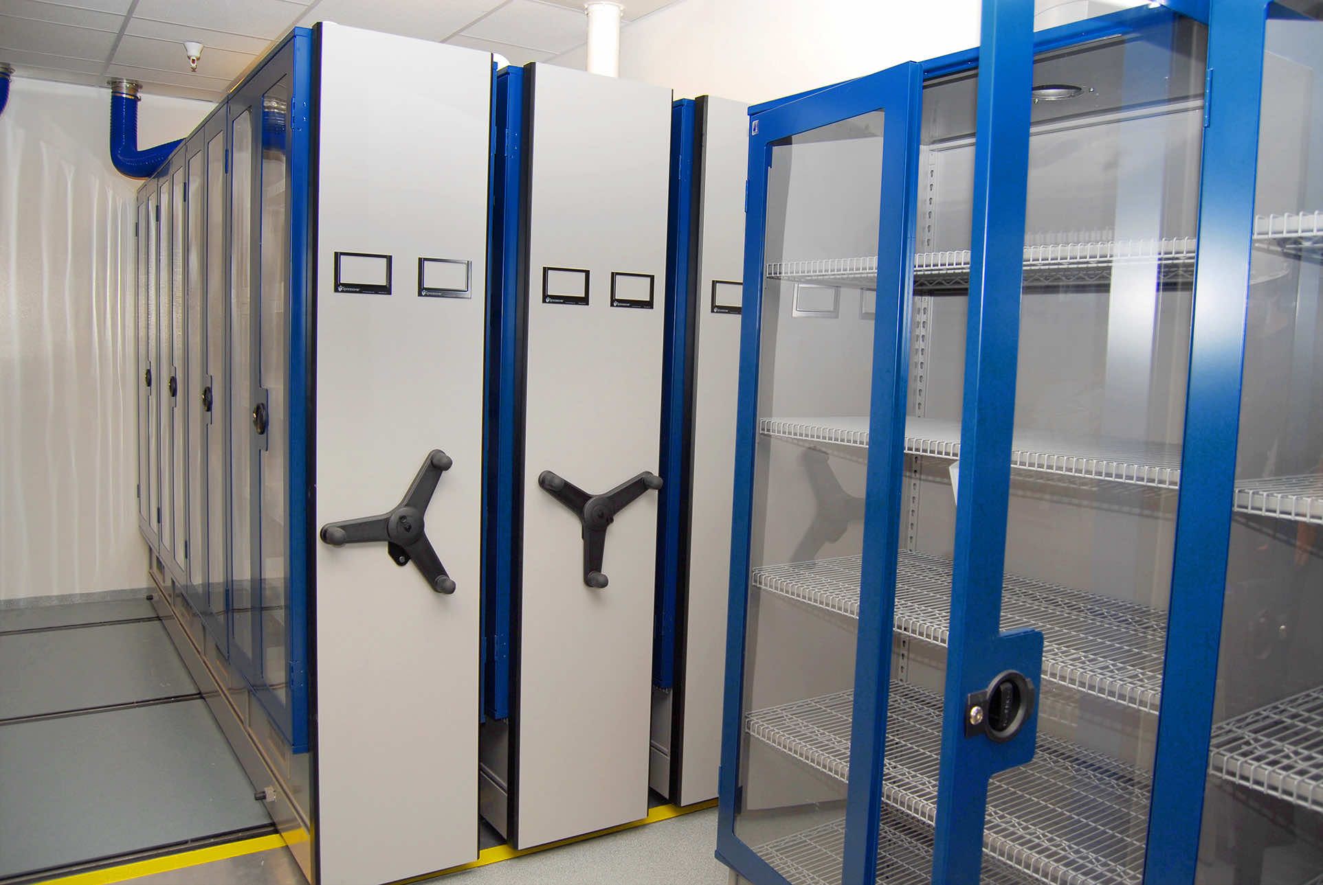 Mechanical assist storage system with glass doors