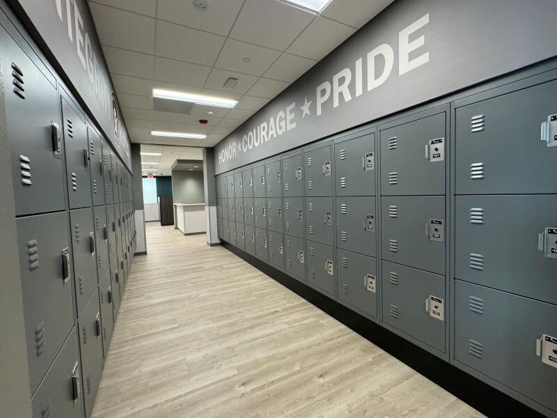 Police department hallway with gear lockers installed along both walls