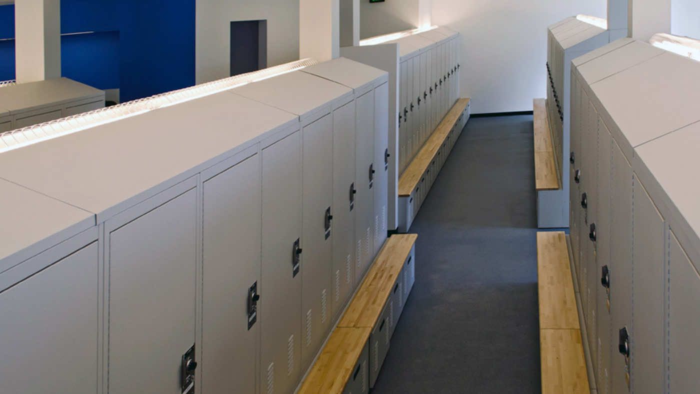 Row of freestyle lockers and benches in Franklin Police Department