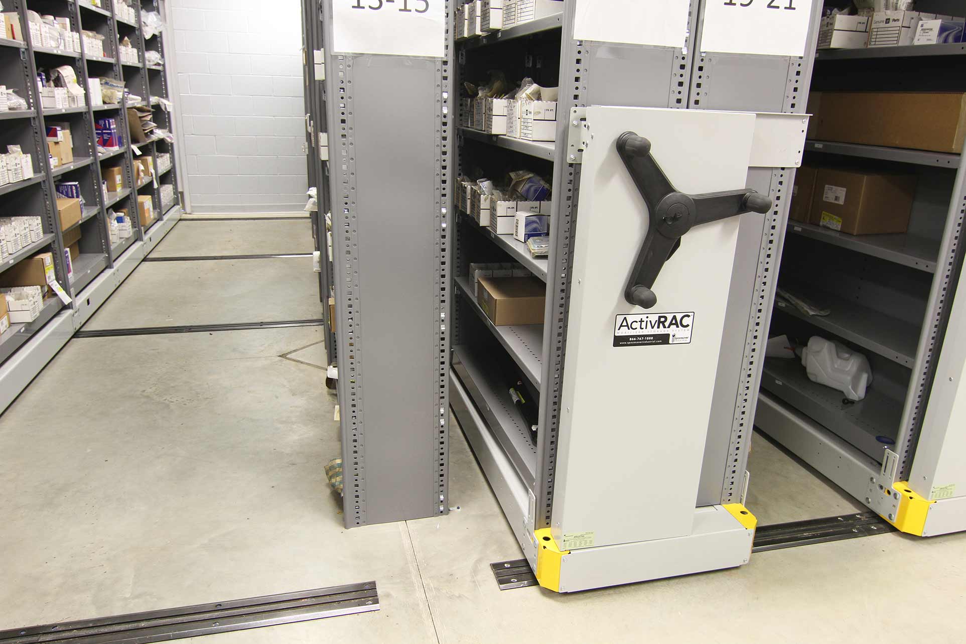 auto parts on a mechanical assist mobile shelving system