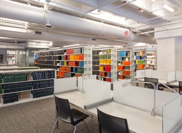 library learning center with desks and shelving