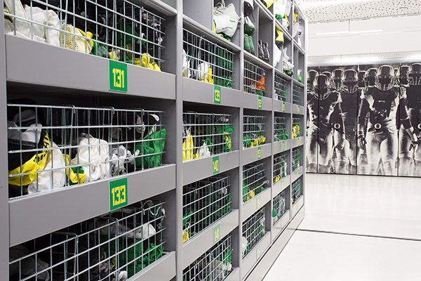 University of Oregon Football equipment room with custom high-density mobile storage system installed