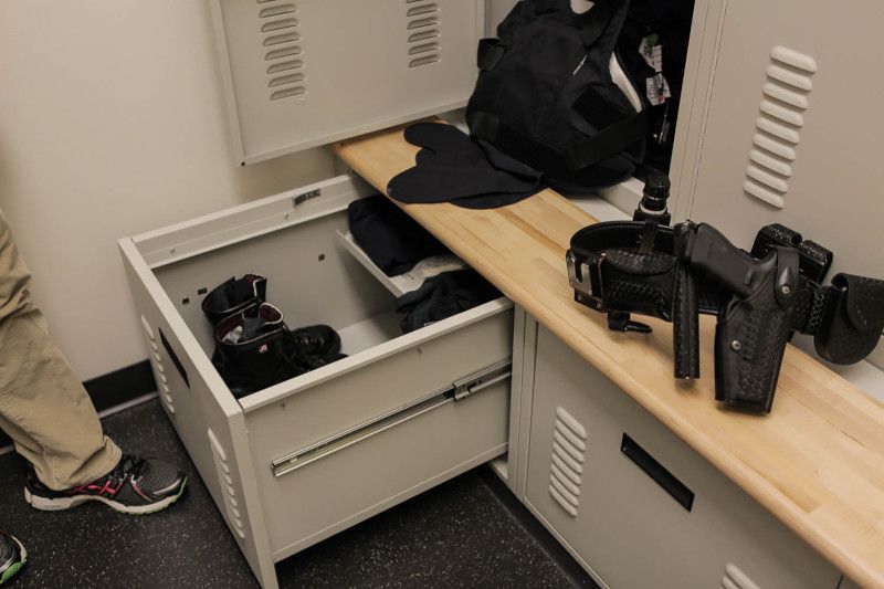 parker police department lockers and pull out drawer full of gear 