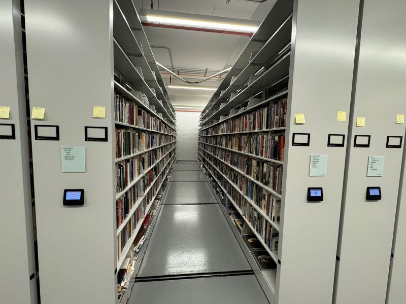 Aisle view of the book storage Powered Mobile Shelving system in Pritzker's book storage wing