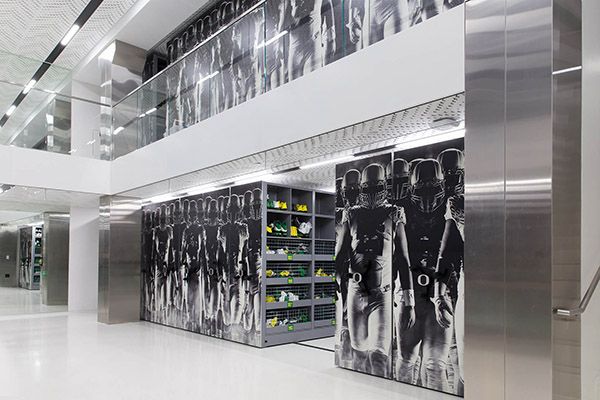 University of Oregon Football equipment room with custom high-density mobile storage system installed
