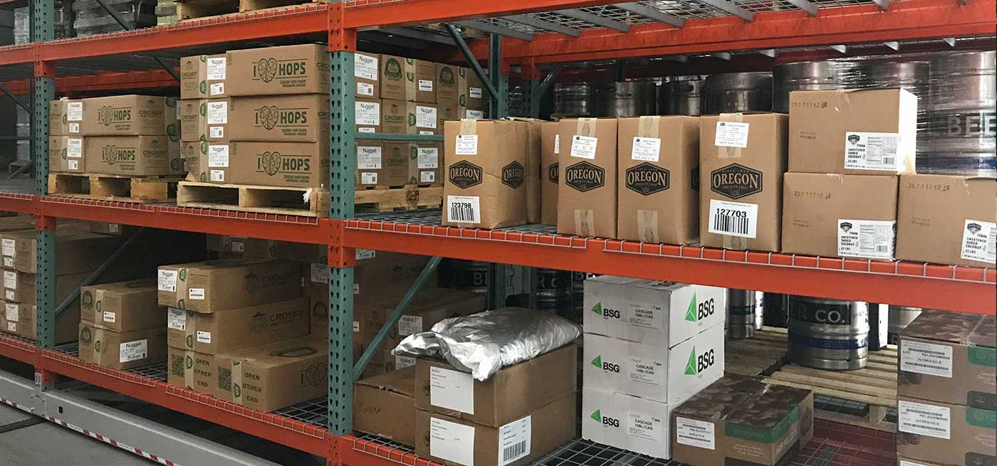 boxes and beer kegs on heavy duty mobile shelving system