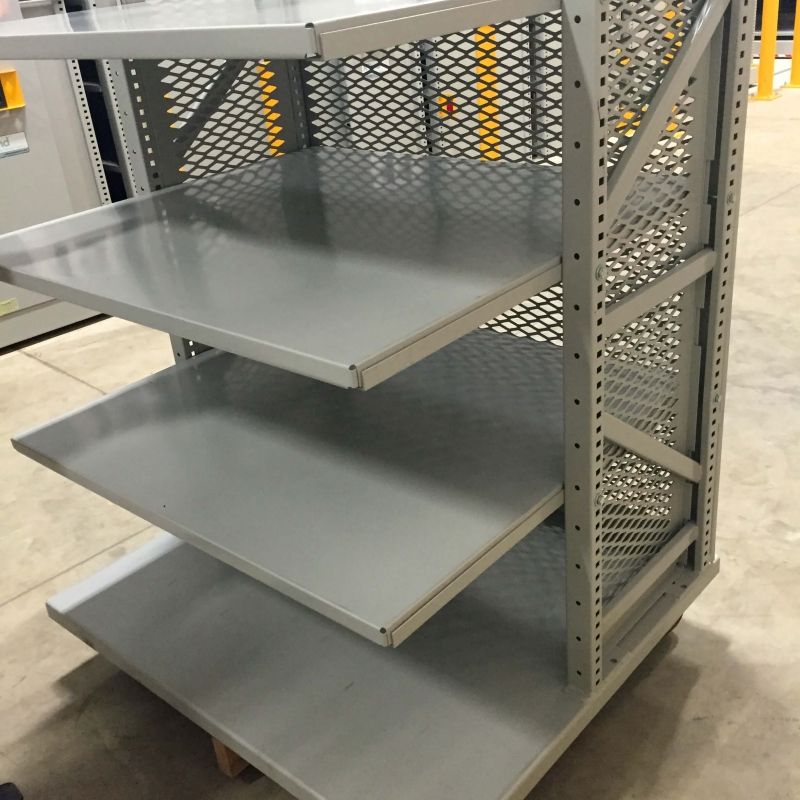 Metal Spacesaver shelving on a cart