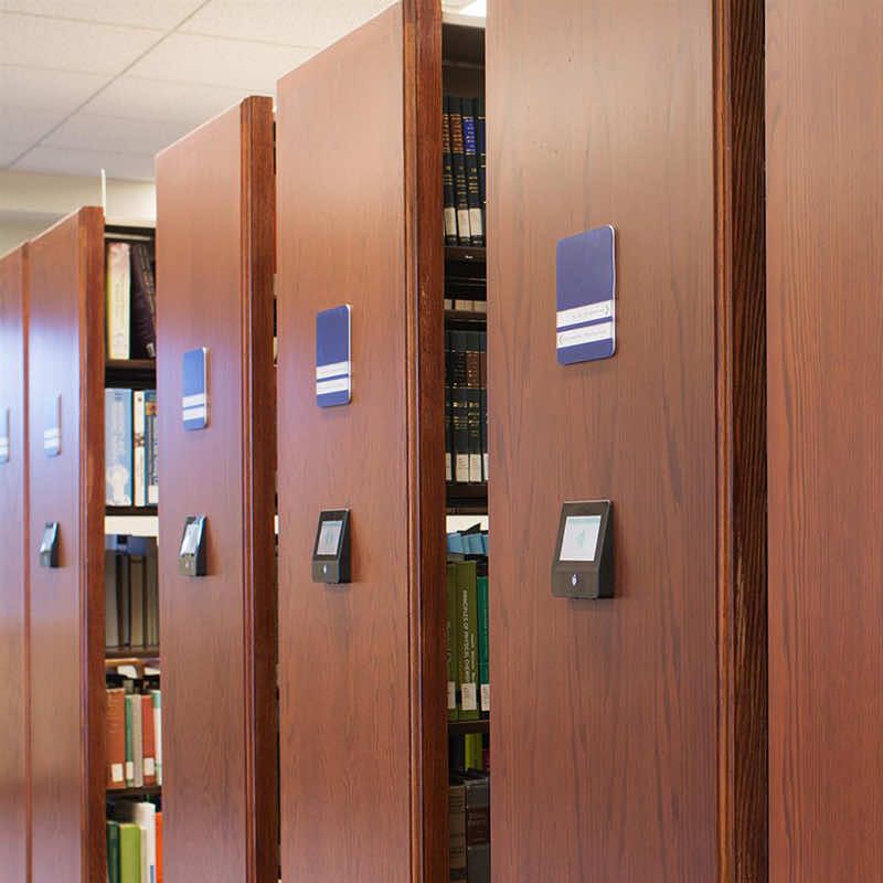 Powered mobile shelving systems with LCD controls at a library