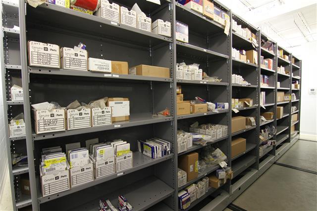 industrial parts and boxes stored on a high-density mobile storage system