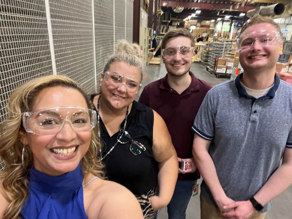 Spacesaver culture team members taking a group photo