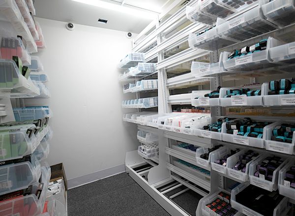 dispensary inventory back room using spacesaver shelving and bins