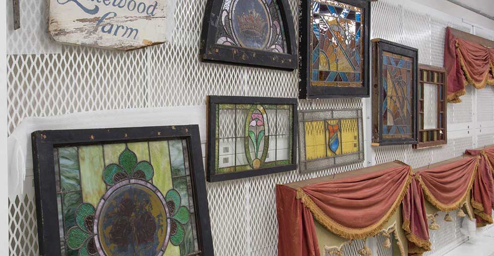 historic artifact storage on display on art rack