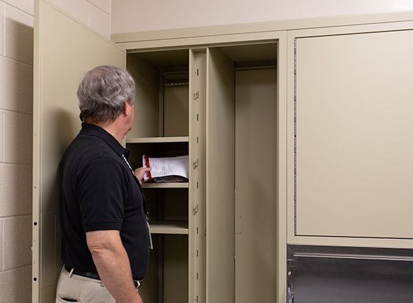evidence processing room pass back locker