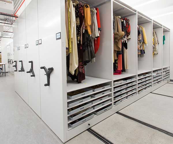 High-density mobile storage system with hanging clothes in fashion museum