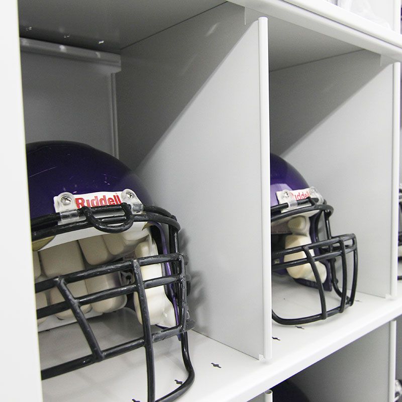 football helmets stored on compact shelving system