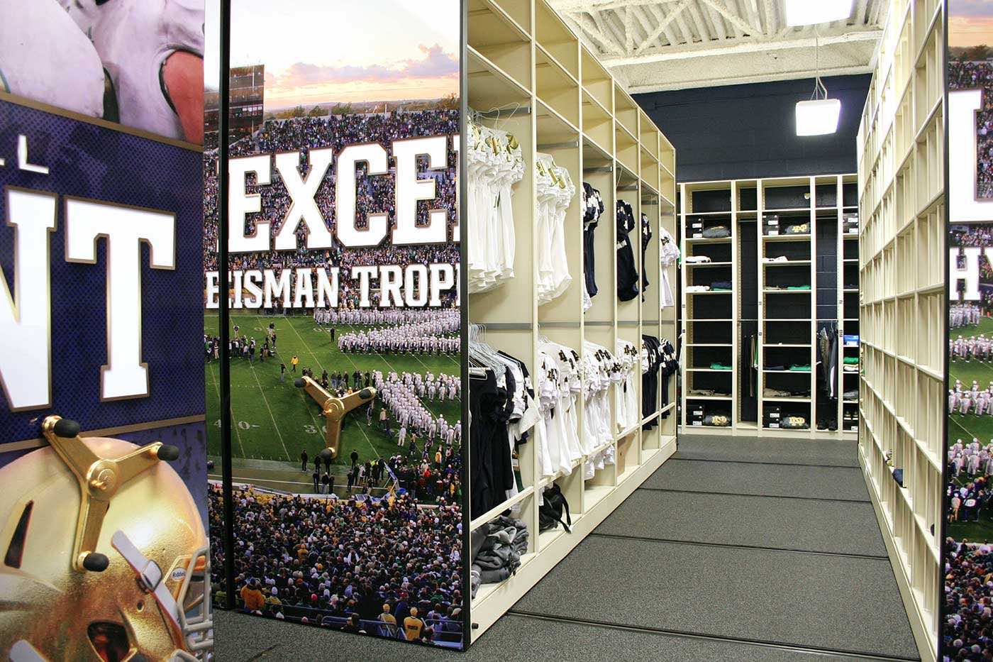 college football equipment stored on compact mobile shelving
