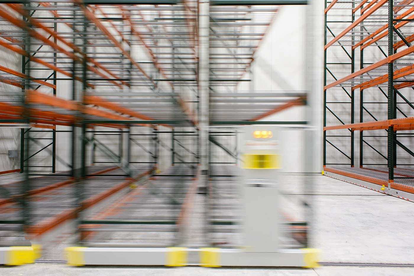 freezer warehouse powered mobile racking system moving to the left
