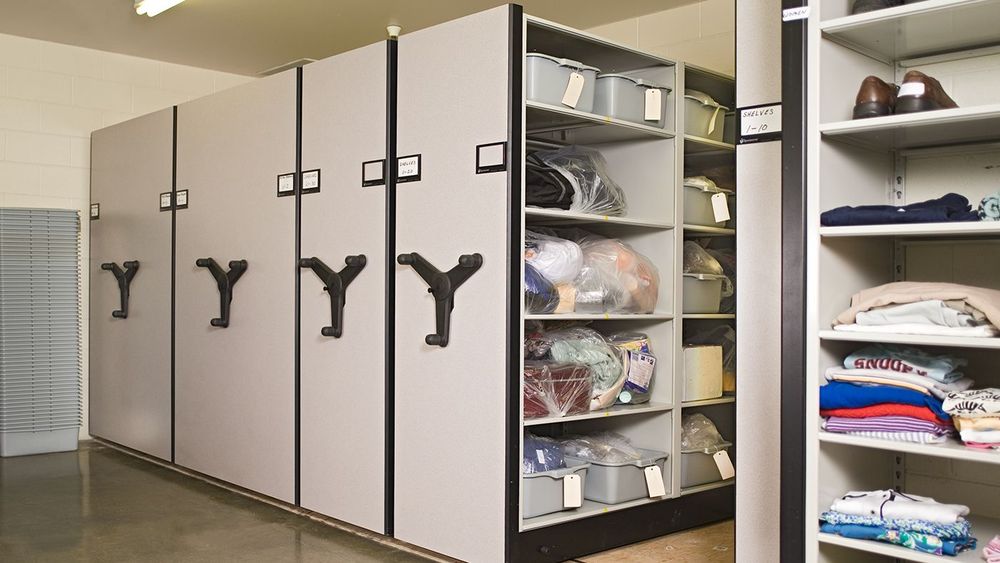 Spacesaver Mechanical-Assist System holding corrections facility clothes