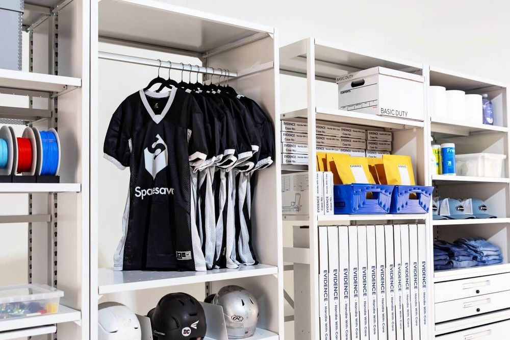 4-Post FreeSpan holding a variety of items including jerseys, helmets, banker boxes, and bins