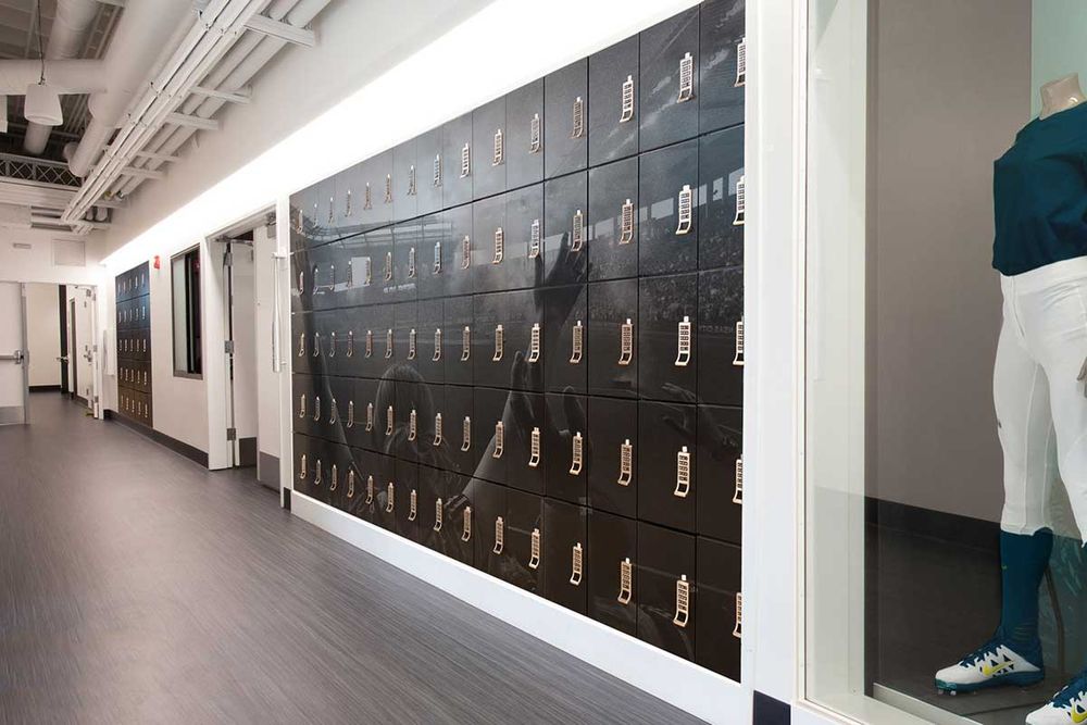day use locker in wall with custom wrap