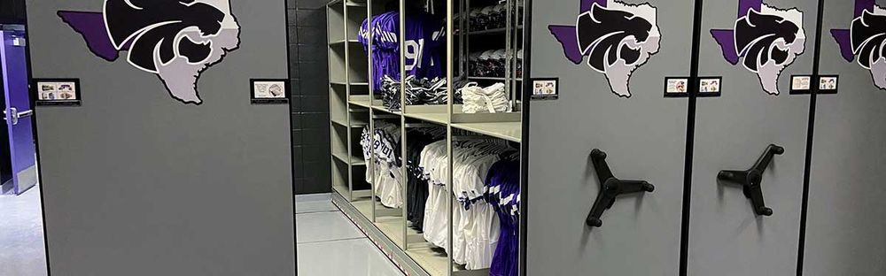 high school football jerseys on a mechanical assist storage system