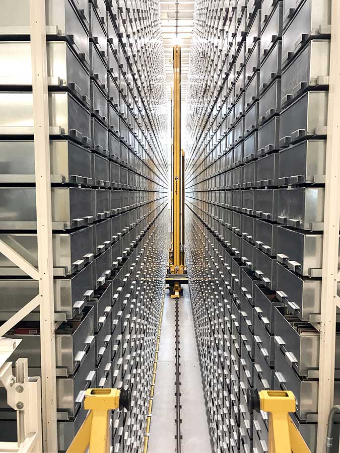tall heavy duty shelving system in off-site warehouse