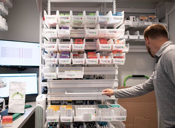lateral dispensary shelving system