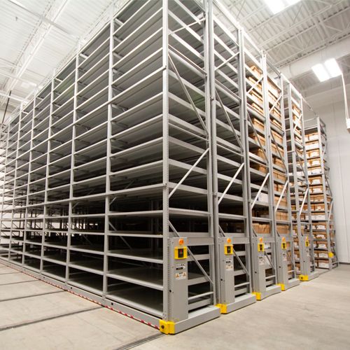 High-Bay Mobile Shelving System holding boxes of manufacturing parts
