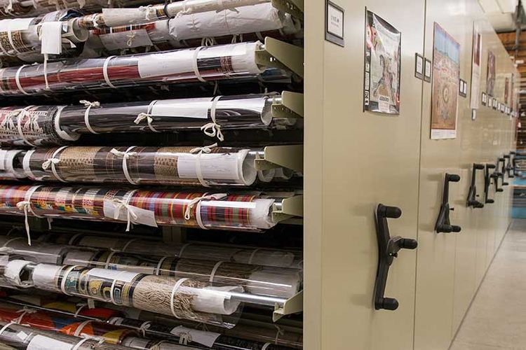 rolled textile rack on mechanical assist high-density system