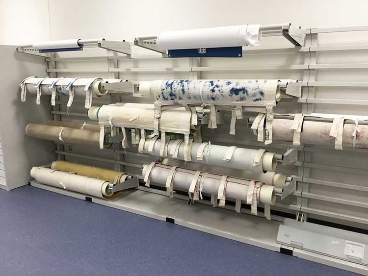 rolled banner storage on cantilever rolled textile rack