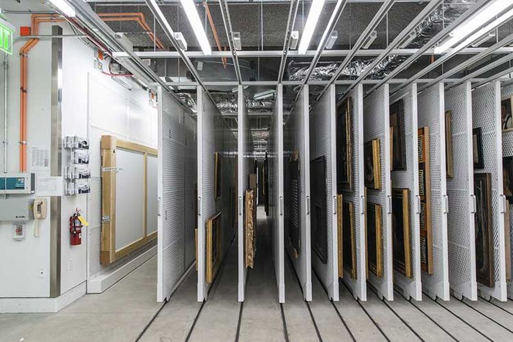 floor supported pullout art racks with artwork