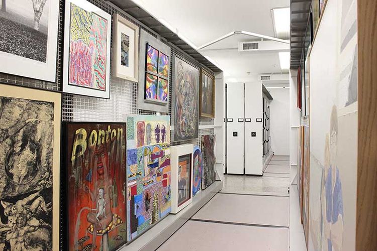 carriage mounted art racks on Spacesaver compactor system