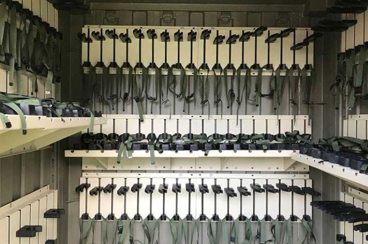 tricon shipping container UEWSS outfitted for storing weapons