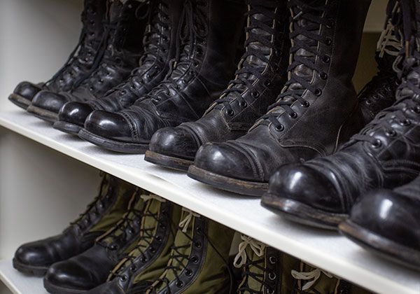 museum military boots collection stored on high density mobile shelving