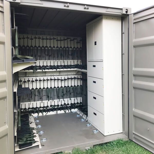 open tricon weapons shipping container full of guns