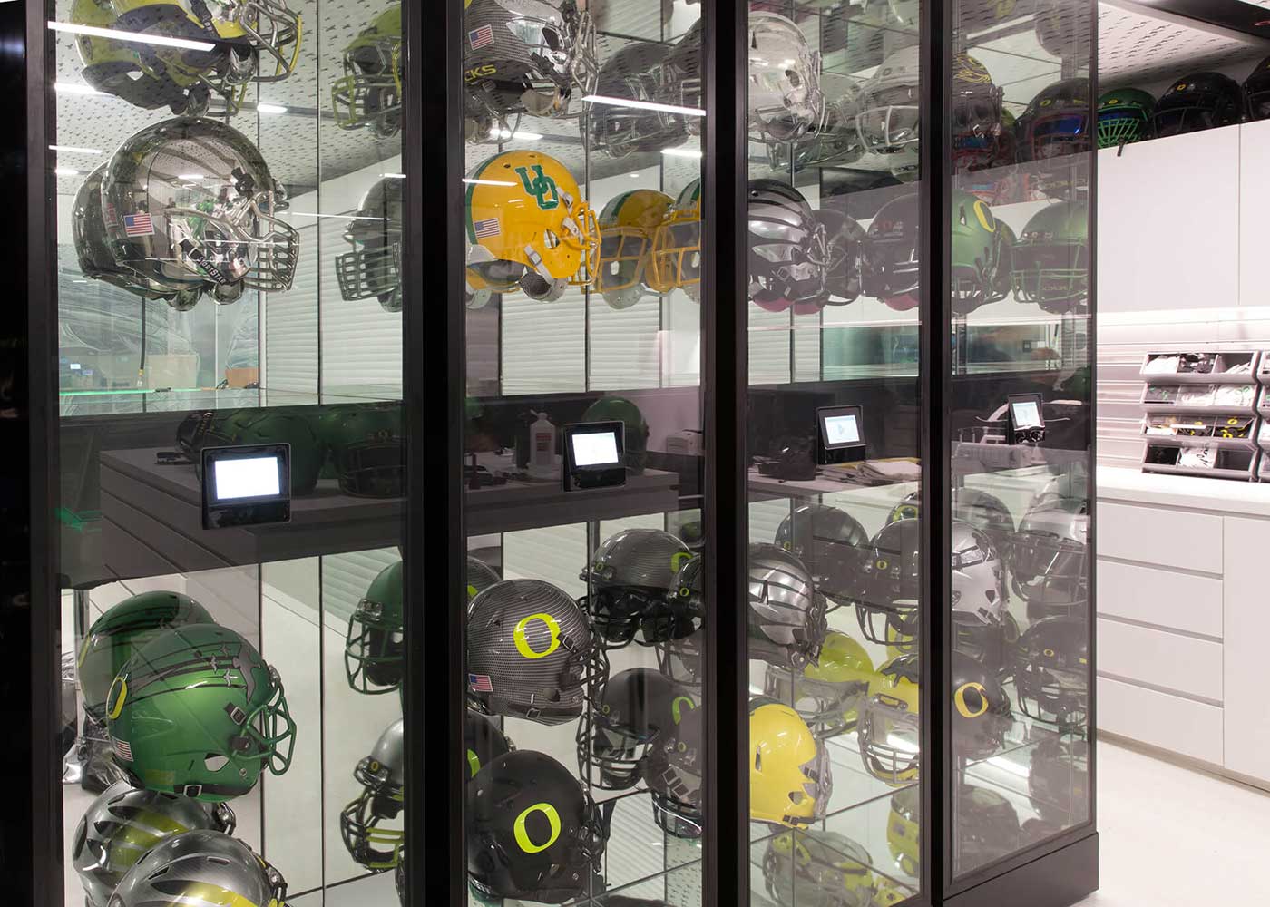 Powered mobile storage system displaying different football helmet iterations