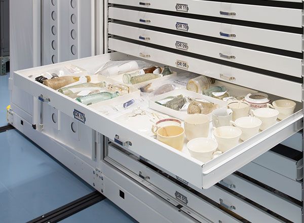 pull out drawers holding museum collection on mobile storage system 