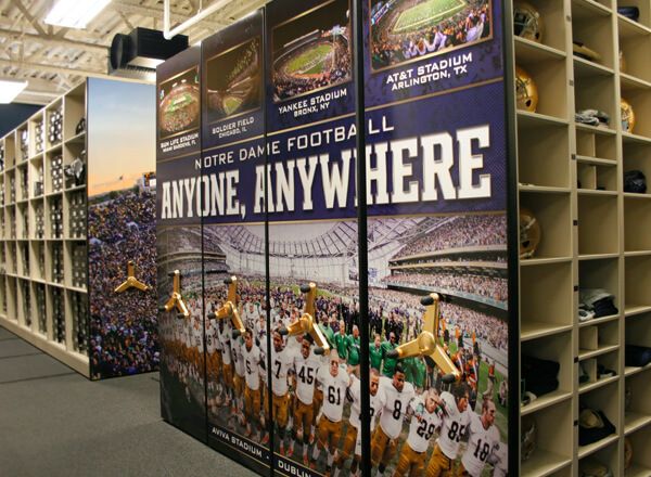 Notre dame football equipment on Spacesaver mechanical assist storage system featuring custom Notre Dame graphics