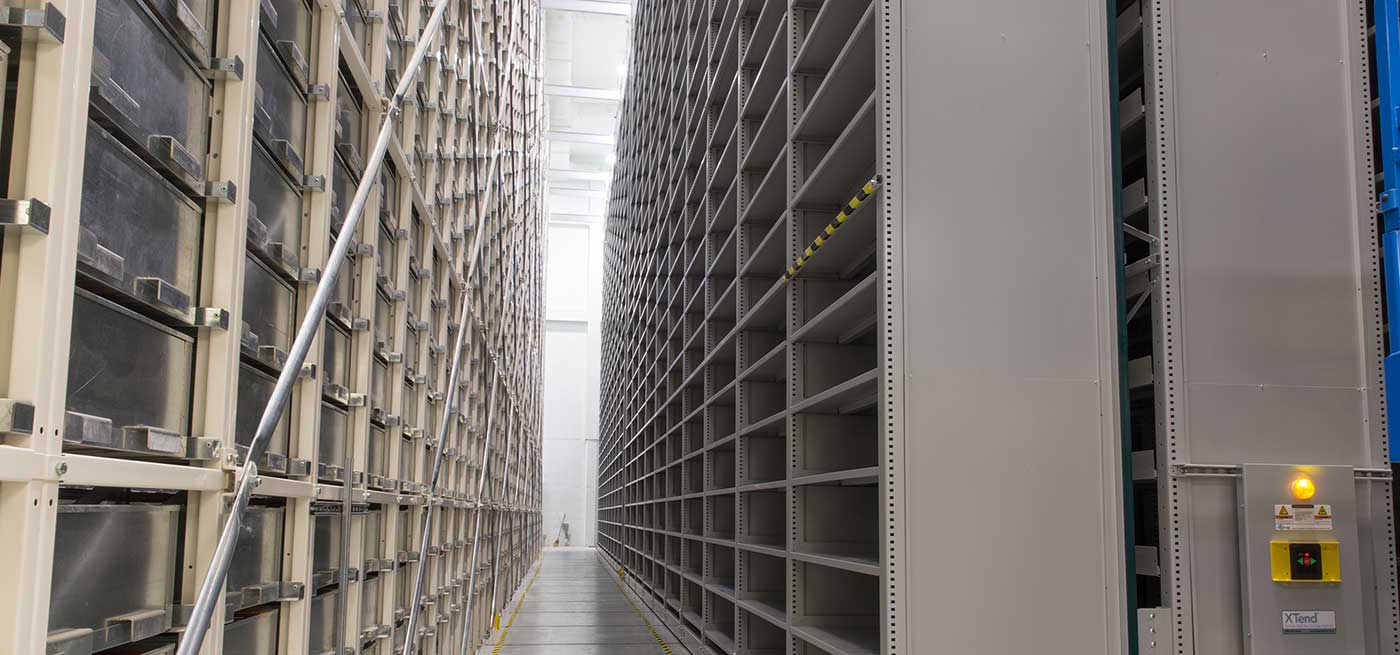 high-bay powered shelving system in off-site university warehouse