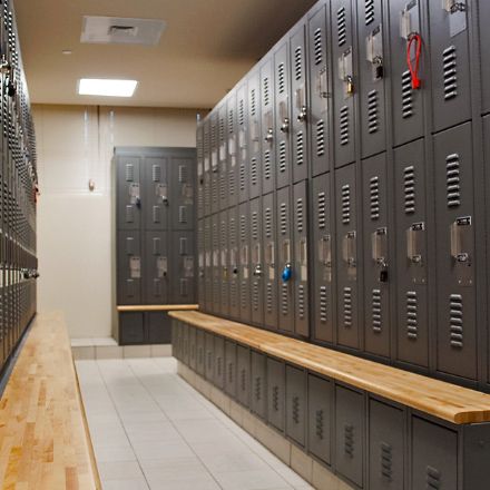 police locker room with 2 tier lockers and benches
