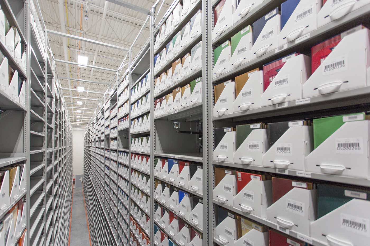 Documents and books stored on Spacesaver High-Bay stacks in off-site storage