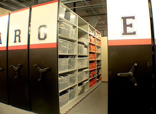 k-12 athletic equipment storage on mechanical assist high-density system