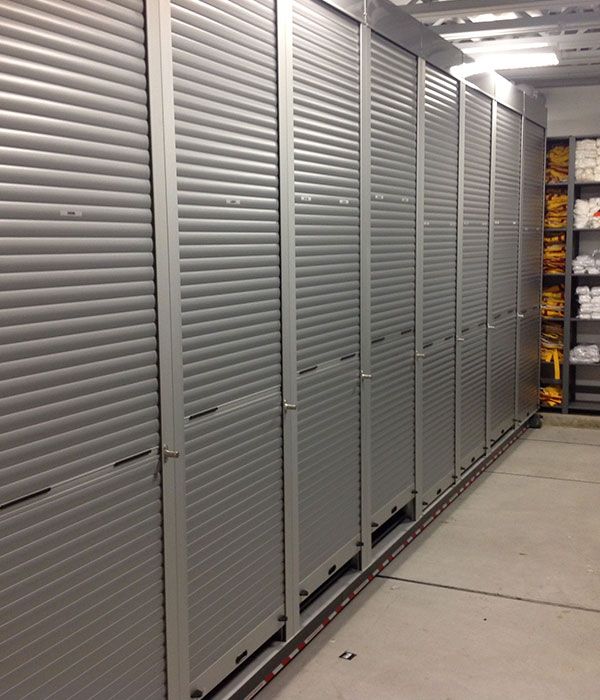 secure athletic equipment storage solution with tambour doors closed