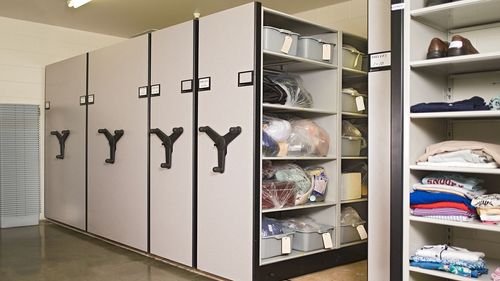 Spacesaver Mechanical-Assist System holding corrections facility clothes