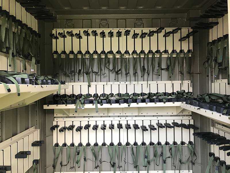 Tricon shipping container UEWSS outfitted for storing long guns