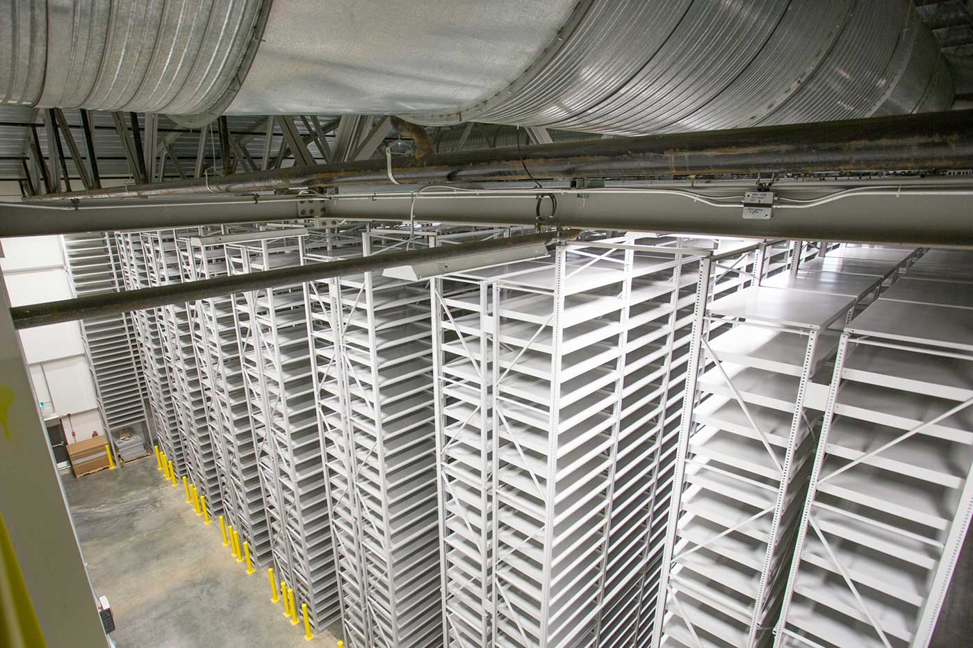 High-bay shelving stacks at the University of Alberta's off-site storage facility