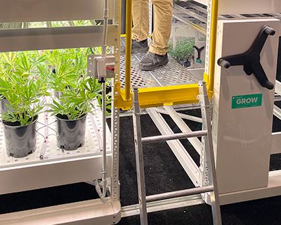 Spacesaver vertical grow racking second tier and crosswalk accessory