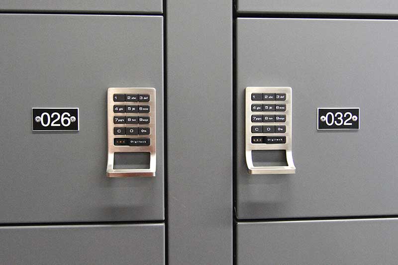digital keypad locks on wall-mounted gun lockers